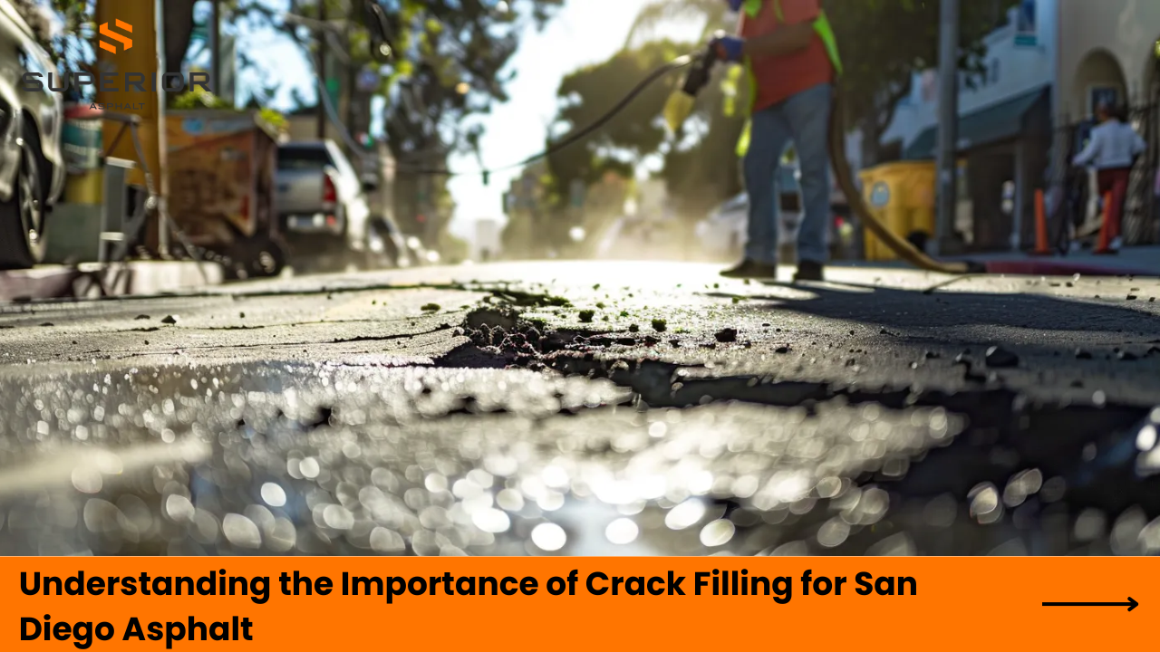Worker applying crack filling on asphalt surface in San Diego, highlighting the importance of pavement maintenance and repair.